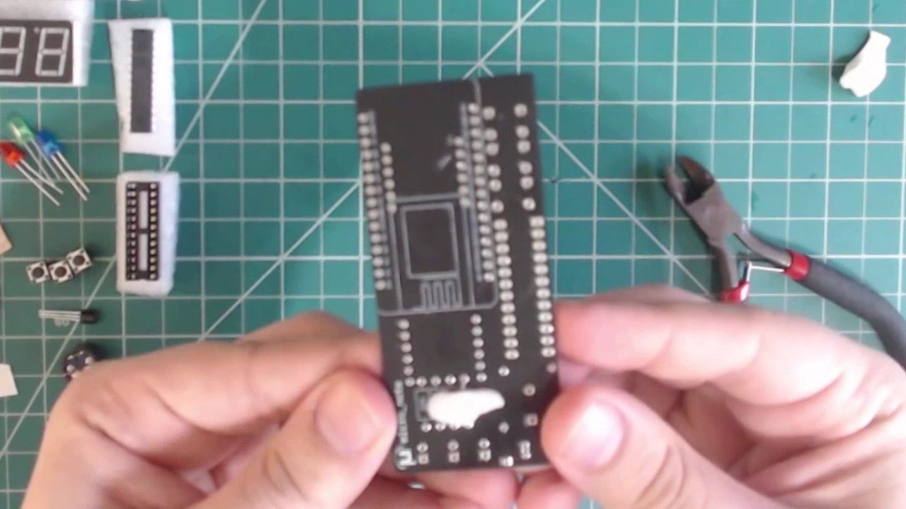 Putty placed on top of the resistor to hold it in place.