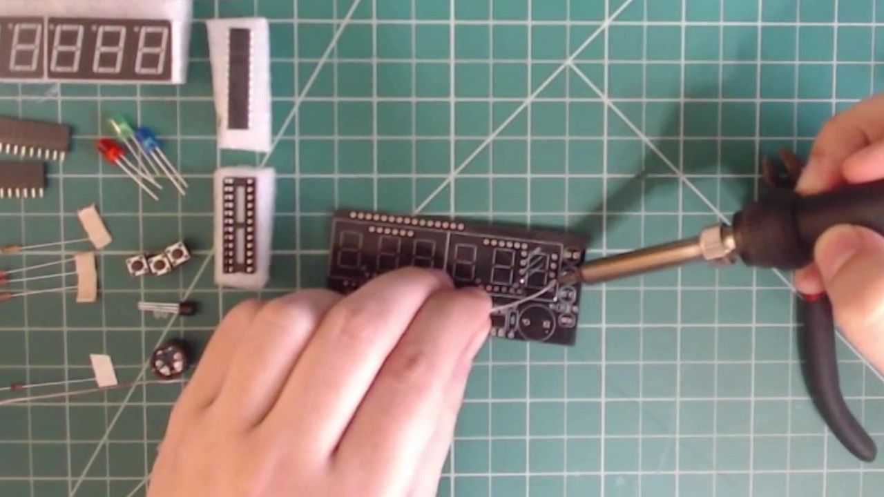Solder the resistor in place.