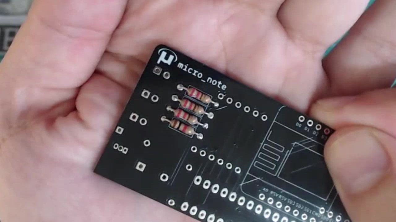 The 1k resistor and three 220Ω resistors soldered in place.
