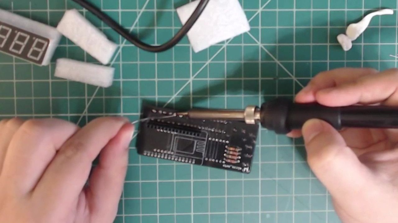 Solder the buttons onto the PCB.